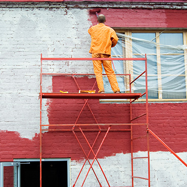 Home exterior being painted